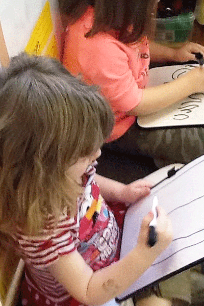 Children drawing pictures at a daycare in Delaware OH